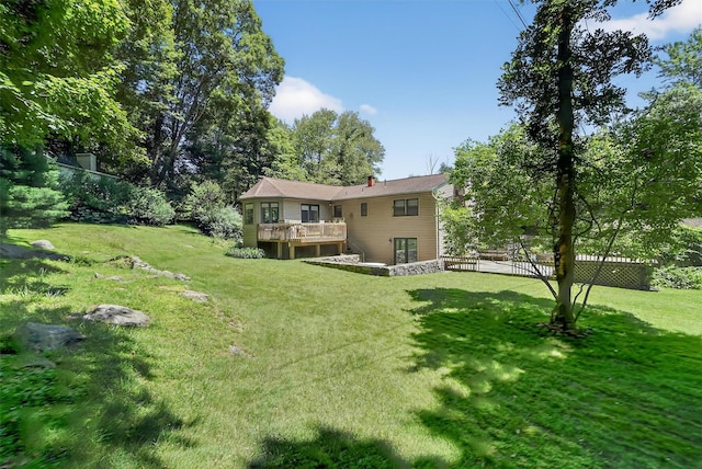 127 Bullet Hole Rd, Carmel, NY 10512 - view of green lawn with a deck