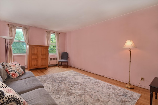1 Georgia Ave Unit 3E, Bronxville, NY 10708 - living area featuring radiator and light wood-style flooring