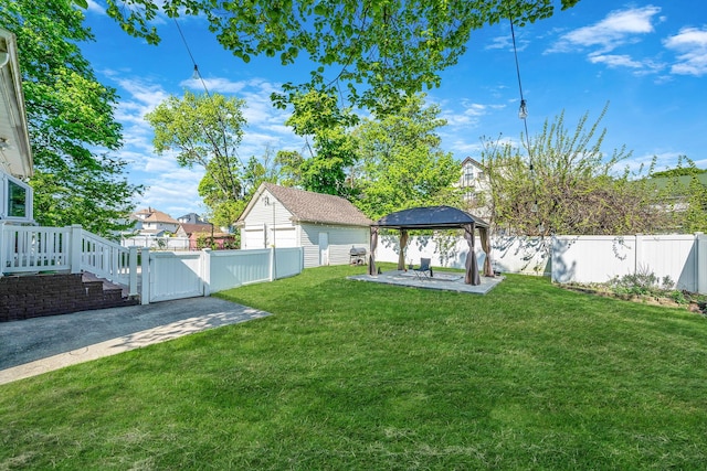 26 Rosedale Ave, Freeport, NY 11520 - fenced backyard featuring a gazebo, a patio, and a gate
