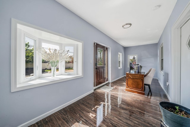 26 Rosedale Ave, Freeport, NY 11520 - foyer entrance with healthy amount of natural light and wood finished floors