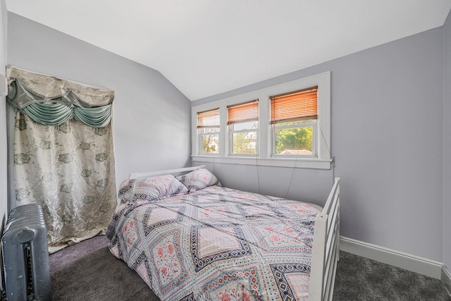 26 Rosedale Ave, Freeport, NY 11520 - carpeted bedroom with vaulted ceiling and baseboards