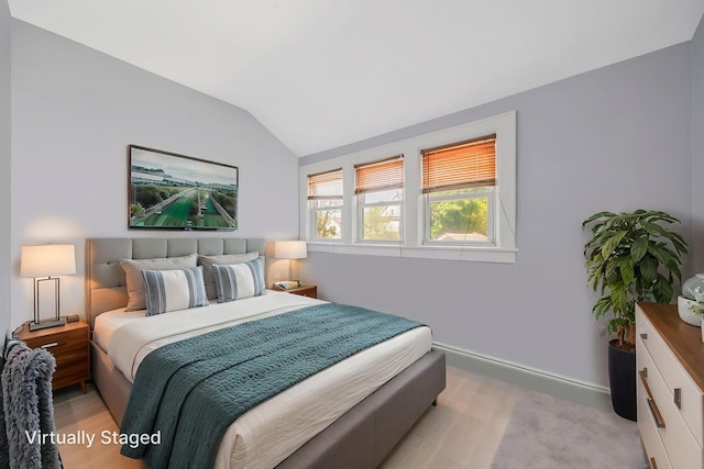 26 Rosedale Ave, Freeport, NY 11520 - bedroom with lofted ceiling and baseboards
