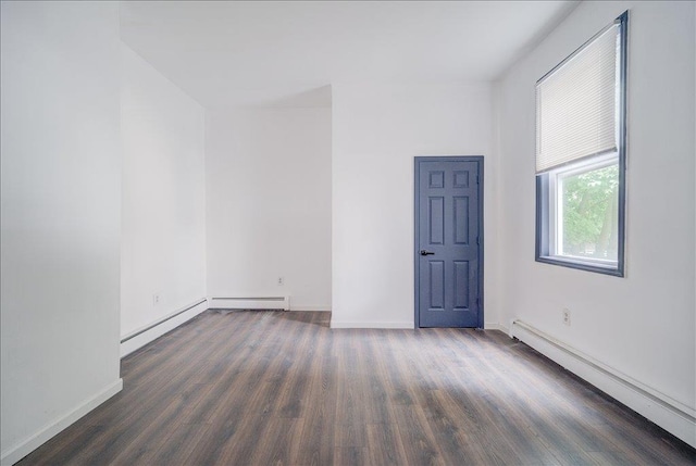 97 E Main St, Middletown, NY 10940 - empty room featuring a baseboard radiator and wood finished floors
