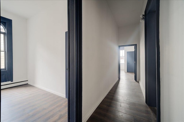 97 E Main St, Middletown, NY 10940 - hall featuring a baseboard radiator and wood finished floors