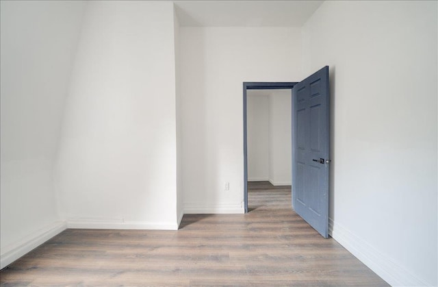 97 E Main St, Middletown, NY 10940 - empty room with wood finished floors