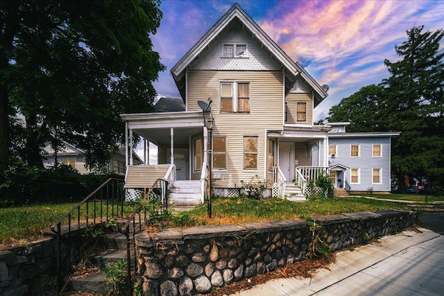 221 E Main St, Middletown, NY 10940 - victorian home featuring a porch