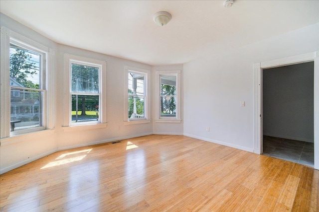 221 E Main St, Middletown, NY 10940 - unfurnished room featuring light wood finished floors and a smoke detector