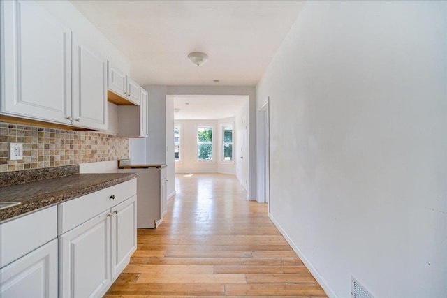 221 E Main St, Middletown, NY 10940 - corridor with light wood-style flooring and baseboards