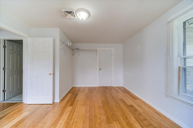 221 E Main St, Middletown, NY 10940 - walk in closet with light wood-style floors