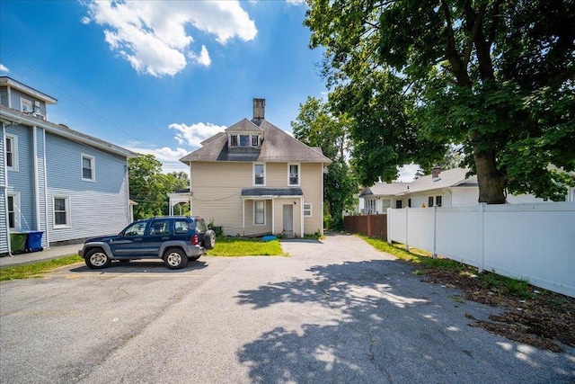 221 E Main St, Middletown, NY 10940 - view of front facade with a chimney