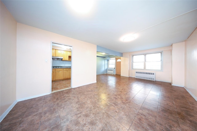 1935 Shore Pkwy Unit 1F, Brooklyn, NY 11214 - empty room with radiator heating unit and baseboards