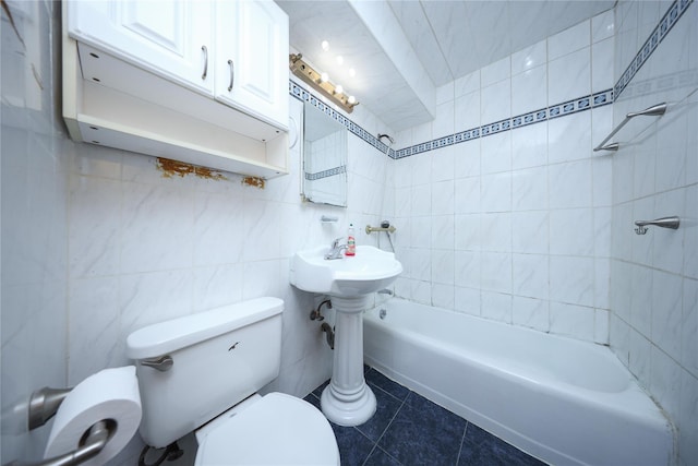 1935 Shore Pkwy Unit 1F, Brooklyn, NY 11214 - bathroom featuring tile walls, tile patterned flooring, and shower / washtub combination
