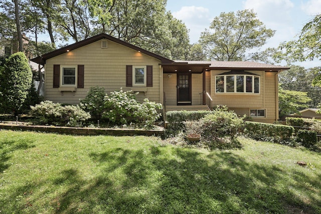 65 Winston Dr, Smithtown, NY 11787 - ranch-style home with a front yard