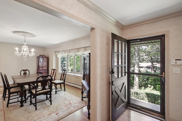 65 Winston Dr, Smithtown, NY 11787 - entryway featuring light wood finished floors, ornamental molding, a chandelier, and baseboard heating
