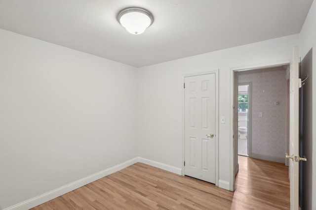 65 Winston Dr, Smithtown, NY 11787 - unfurnished room featuring light wood-type flooring and baseboards