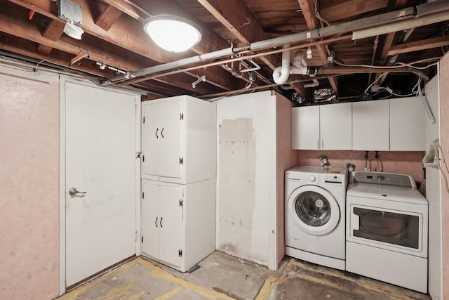 65 Winston Dr, Smithtown, NY 11787 - laundry room featuring cabinet space and washing machine and dryer