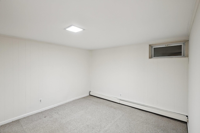 65 Winston Dr, Smithtown, NY 11787 - carpeted empty room with baseboard heating and baseboards