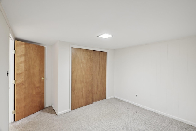 65 Winston Dr, Smithtown, NY 11787 - unfurnished bedroom featuring carpet flooring and a closet