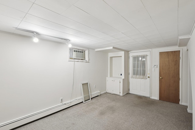 65 Winston Dr, Smithtown, NY 11787 - finished basement featuring baseboard heating, light carpet, and a wall mounted AC