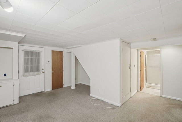 65 Winston Dr, Smithtown, NY 11787 - basement with carpet flooring and a paneled ceiling