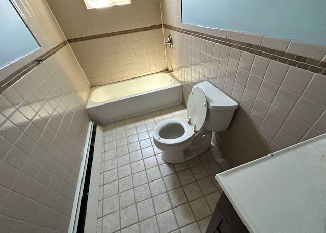 58 Hauppauge Rd, Hauppauge, NY 11788 - full bathroom featuring tile walls, vanity, and tile patterned flooring