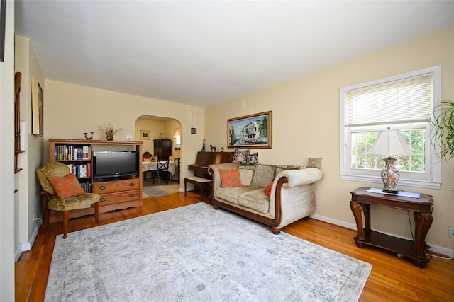 50-40 184th St, Fresh Meadows, NY 11365 - living area featuring arched walkways and wood finished floors