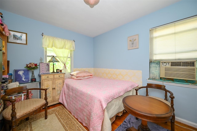 50-40 184th St, Fresh Meadows, NY 11365 - bedroom with wood finished floors and cooling unit