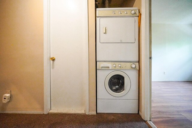 504 Julius Rd Unit 7C, College Point, NY 11356 - laundry area featuring stacked washer and clothes dryer and carpet floors