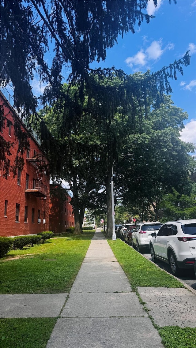 14133 78th Ave Unit 3B, Kew Garden Hills, NY 11367 - view of street featuring sidewalks
