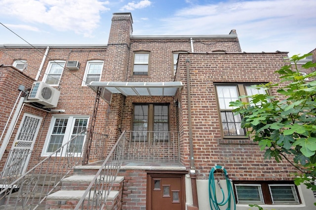 64-66 82nd Pl, Middle Village, NY 11379 - view of property with brick siding