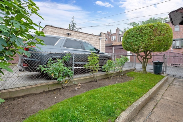 64-66 82nd Pl, Middle Village, NY 11379 - view of yard featuring a gate