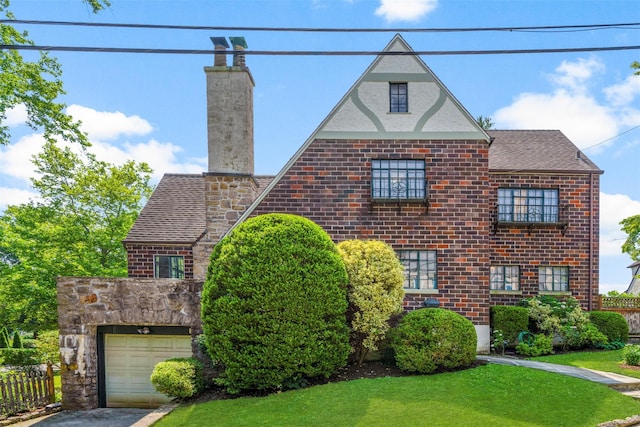 1 Highwood Way, Larchmont, NY 10538 - tudor-style house with a chimney and stone siding