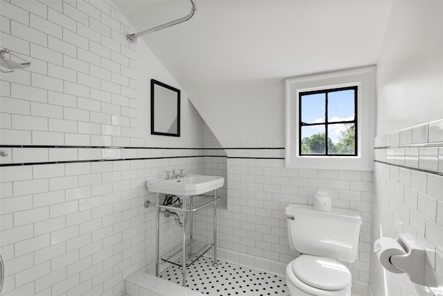 1 Highwood Way, Larchmont, NY 10538 - bathroom featuring tile walls, vaulted ceiling, and wainscoting