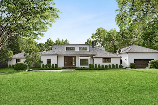 178 Skimhampton Rd, Amagansett, NY 11937 - view of front of home featuring a chimney, a front lawn, a garage, and roof with shingles