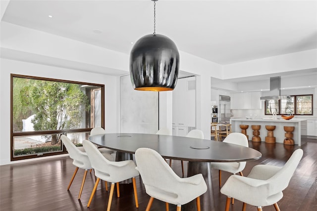 178 Skimhampton Rd, Amagansett, NY 11937 - dining space with healthy amount of natural light and dark wood-style flooring