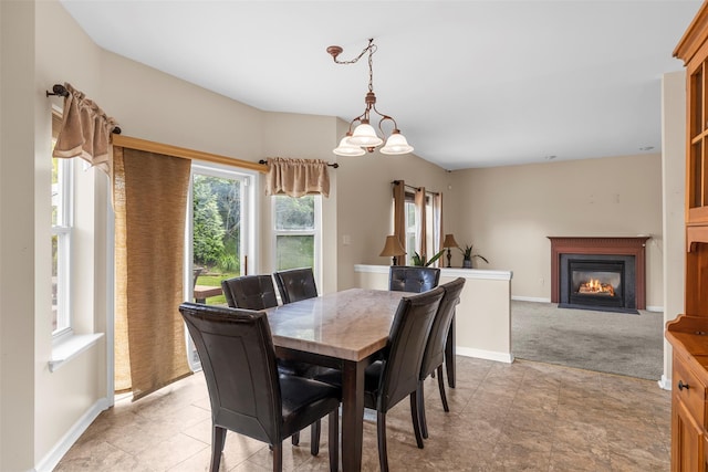 9 June Rd, Chester, NY 10918 - dining room with plenty of natural light and a glass covered fireplace