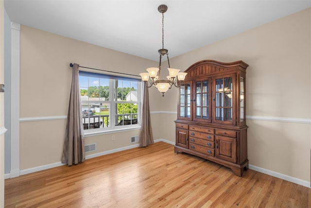 9 June Rd, Chester, NY 10918 - dining room featuring a chandelier and light wood finished floors