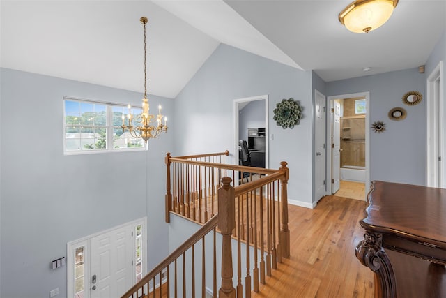 9 June Rd, Chester, NY 10918 - hallway featuring an upstairs landing, a chandelier, light wood-type flooring, and lofted ceiling