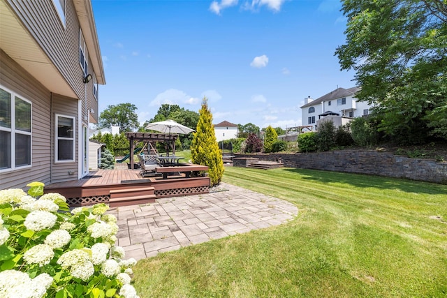9 June Rd, Chester, NY 10918 - view of green lawn with a wooden deck and a patio