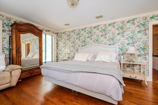 34 Elm St, Great Neck, NY 11021 - bedroom with wallpapered walls, wood finished floors, crown molding, and radiator