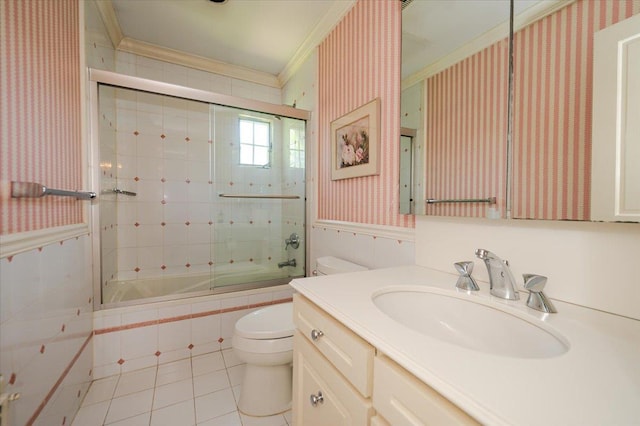 34 Elm St, Great Neck, NY 11021 - full bathroom featuring ornamental molding, wallpapered walls, tiled shower / bath combo, tile patterned floors, and vanity