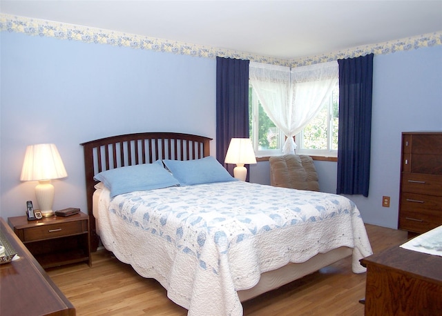 242 Wyandanch Rd, Sayville, NY 11782 - bedroom with light wood-style floors
