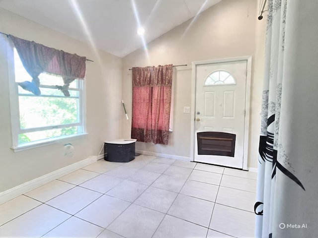42 Oak Dr, Riverhead, NY 11901 - entrance foyer featuring lofted ceiling, plenty of natural light, and light tile patterned flooring