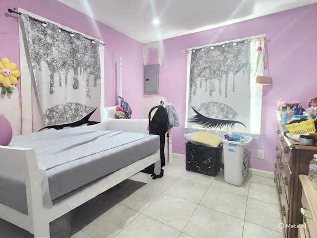 42 Oak Dr, Riverhead, NY 11901 - bedroom with electric panel and light tile patterned flooring