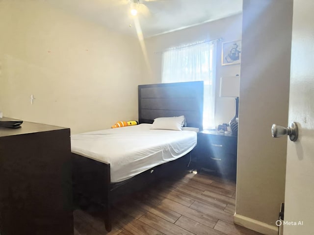 42 Oak Dr, Riverhead, NY 11901 - bedroom with wood finished floors and baseboards
