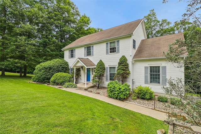10 Jennifer Ln, Carmel, NY 10512 - colonial-style house with a front lawn and a shingled roof