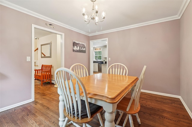 10 Jennifer Ln, Carmel, NY 10512 - dining area with a chandelier, wood finished floors, and crown molding