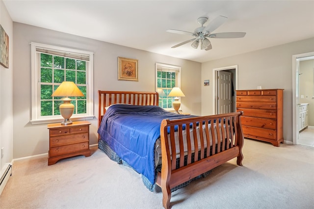 10 Jennifer Ln, Carmel, NY 10512 - bedroom featuring carpet, a baseboard heating unit, connected bathroom, and a ceiling fan