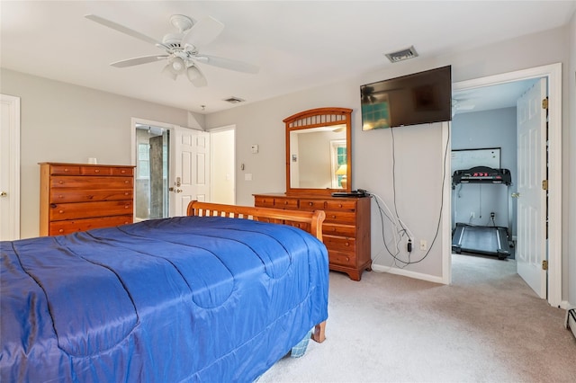 10 Jennifer Ln, Carmel, NY 10512 - bedroom with light carpet, ceiling fan, ensuite bath, and a baseboard radiator