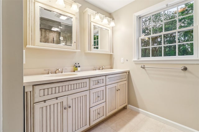 10 Jennifer Ln, Carmel, NY 10512 - full bathroom featuring double vanity, tile patterned floors, and a shower